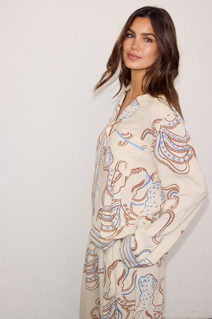 Cream Octopus Button Through Pyjamas with blue and tan marine print and chest pocket detail.