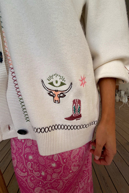 Cream Western Martha Cardigan featuring embroidered western motifs and colourful criss cross stitch detailing on soft knit.