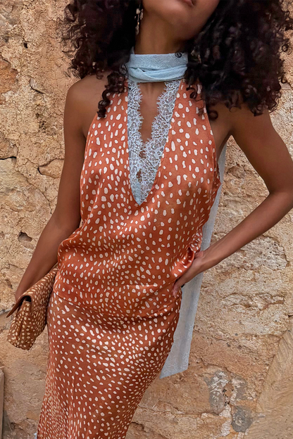Multi-wear Fawn Lily Top in brown fawn print featuring light blue lace neck ties and a deep V-neckline.