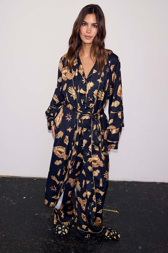 Black Deloris Satin Robe and pyjamas with gold hand motifs, designed in London for feel good dressing.