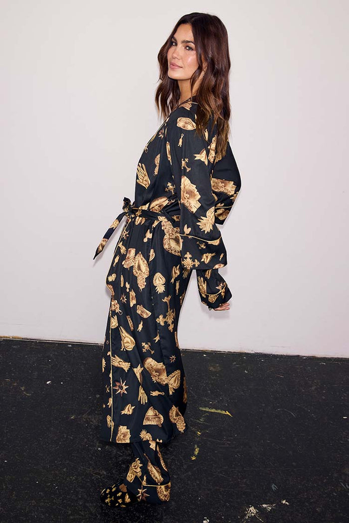Deloris Satin Robe in black featuring gold hand, heart and eye motifs with a waist tie fastening.