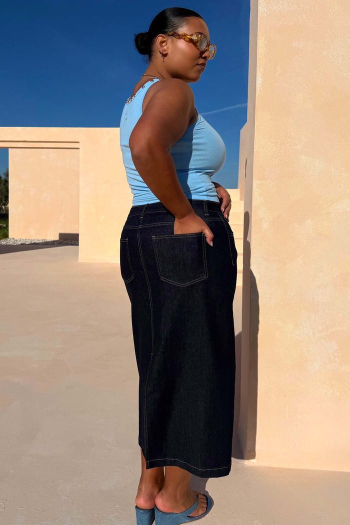 Dark blue Denim Pencil Skirt with contrast stitching and pockets, highlighting inclusive sizing and curve fashion.