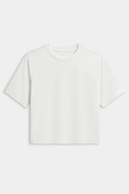 The SPLITS59 Djuna Oversized Jersey Tee in white features a short-sleeve, crew neck design—ideal for gym or outdoor workouts. Shown laid flat on a white background.