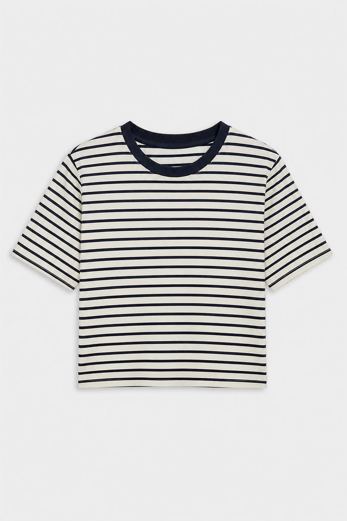 The SPLITS59 Djuna Oversized Jersey Tee in White/Indigo Stripe features short sleeves, a relaxed fit, and a black crew neckline, displayed flat on a white background.