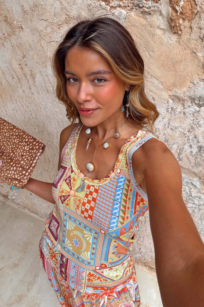 Dolce Vita Ribbed Tank in a multi-colour patchwork print and scoop neck, styled with a leopard print clutch.