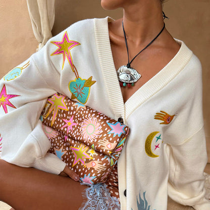 Cream Dreamer Martha Cardigan featuring colourful celestial motifs in a soft-touch knit with a V-neckline.