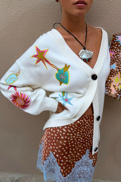 Cream Dreamer Martha Cardigan in soft-touch knit featuring colourful sun and star motifs with a button-up front.