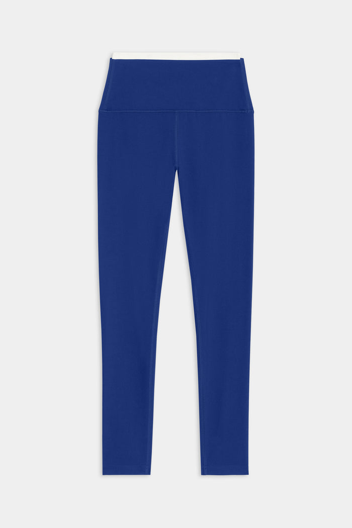 SPLITS59 Dual High Waist Airweight 7/8 Legging in cobalt with a white waistband features a high-waisted design, ideal for hot yoga. Displayed on a white background.