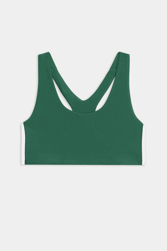 The SPLITS59 Ella Airweight Bra in Arugula/White features a racerback, supportive design, and white side panels—perfect for hot yoga. Shown flat against a white background.