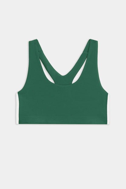 The SPLITS59 Ella Airweight Bra in Arugula/White features a racerback, supportive design, and white side panels—perfect for hot yoga. Shown flat against a white background.