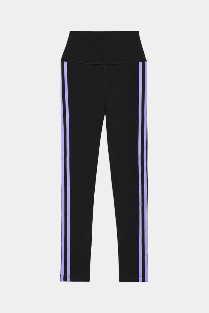 The SPLITS59 Ella High Waist Airweight 7/8 leggings in Black/Purple Haze feature a high waistband and two vertical purple stripes down each leg, shown on a white background.