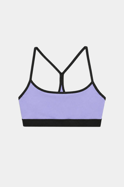 The SPLITS59 Emerson Airweight Bra in Purple Haze/Black features a racerback design, black trim, and a nylon-spandex blend, shown on a plain white background.