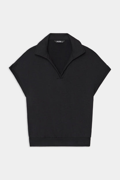 The SPLITS59 Evie Fleece Sleeveless Polo in black features a collared V-neck and loose fit, crafted from a soft modal spandex blend. Displayed on a plain white background.