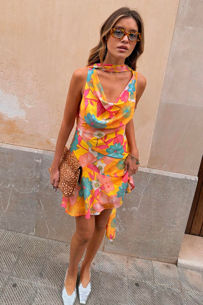 Floral Mini Sophie Dress in a retro orange and pink print with a cowl neck, asymmetric hem and detachable scarf.