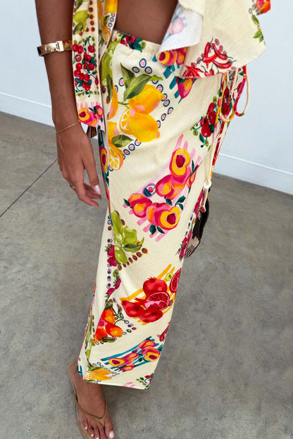 Fruit Stamps Mabel Skirt in cream cotton-linen, featuring a colourful Mediterranean-inspired citrus and fruit print.