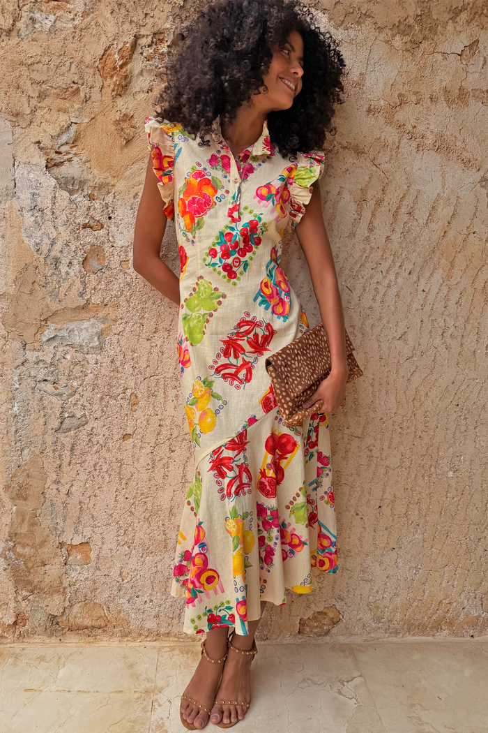 Fruit Stamps Remi Dress in cotton-linen with a fruit sticker print, ruffle sleeves and a tailored button collar.