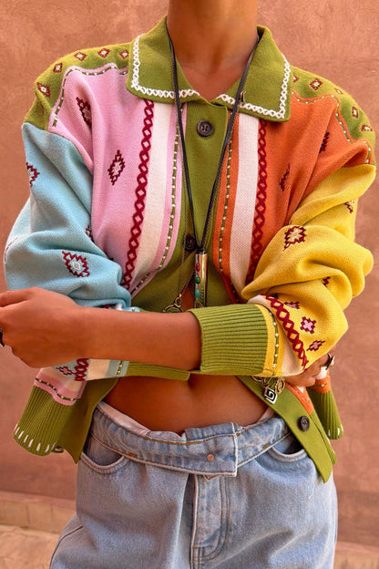 Geometric Palm Cardigan in green with colourful jacquard motifs and blanket stitch detailing.