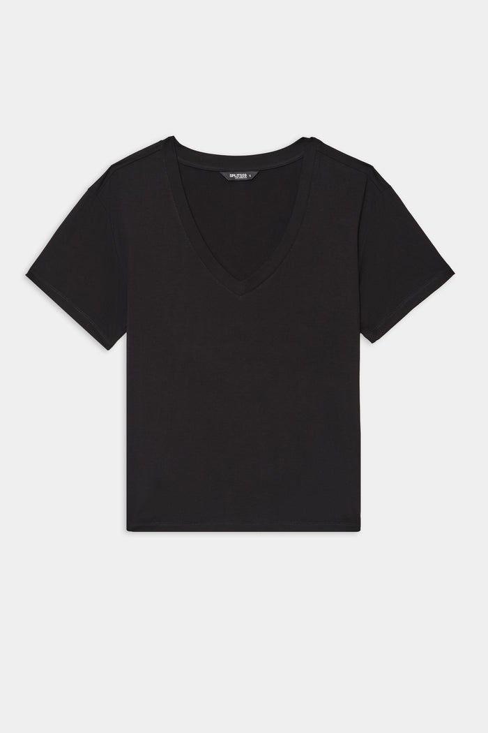 The SPLITS59 Georgia Jersey V-Neck in black is a soft short-sleeve T-shirt, crafted from a viscose and spandex blend, shown laid flat on a white background.