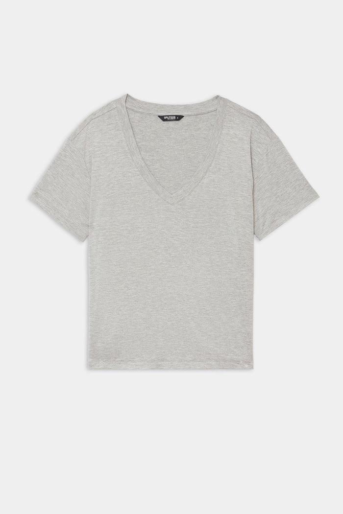 The SPLITS59 Georgia Jersey V-Neck in Heather Grey is a soft spandex short-sleeve t-shirt with a V-neck, shown laid flat on a white background.