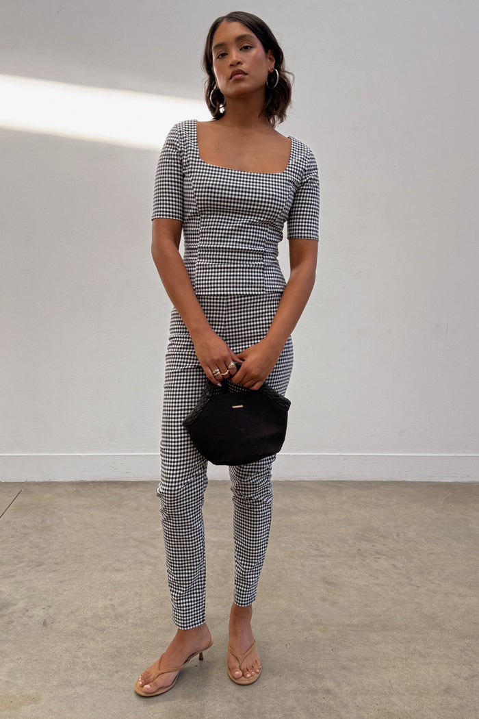 Black and white Gingham Trousers and matching top co-ord featuring a square neckline and skinny leg fit.