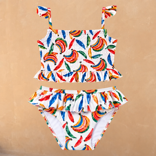 Girl's Banana Bikini featuring a multicoloured banana print on cream with a shirred top and frill details.