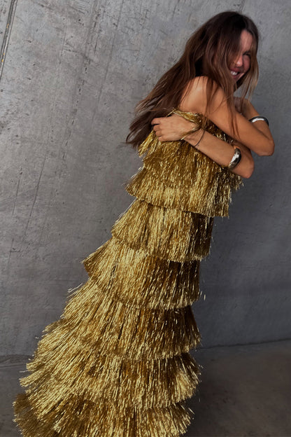 Gold Fringe Dress with layered gold foil tassels, capturing movement and texture for a partywear look.