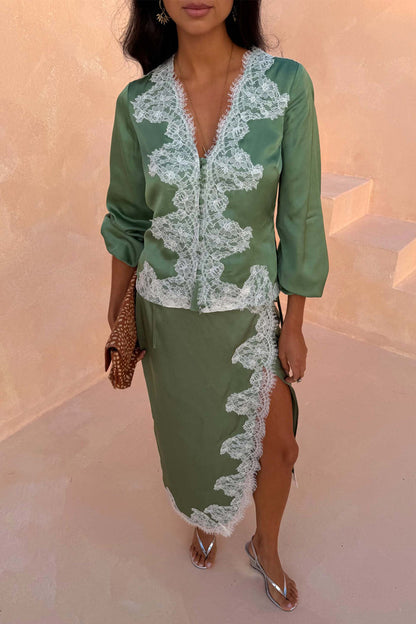 Green Lace Wrap Midi Skirt with white cascading lace detailing and a side slit, styled with a matching top.