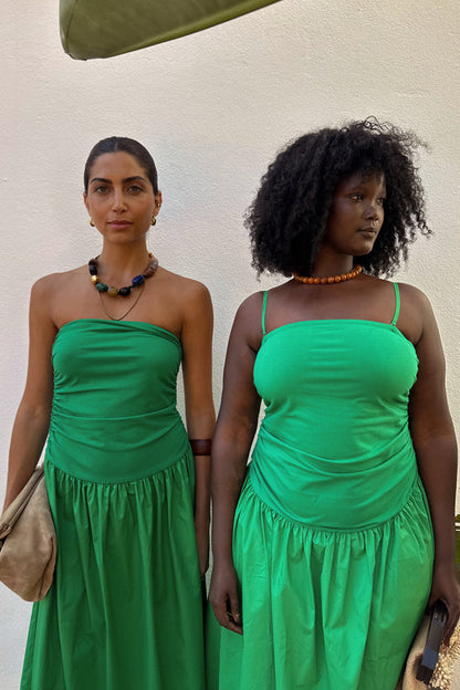 Green Lola Mid-axi Dress with a ruched bodice and multi-wear straps, shown on two models for inclusive sizing.