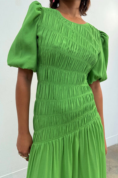 Green Shirred Nara Dress with a shirred bodice and puff sleeves for multi-wear styling.