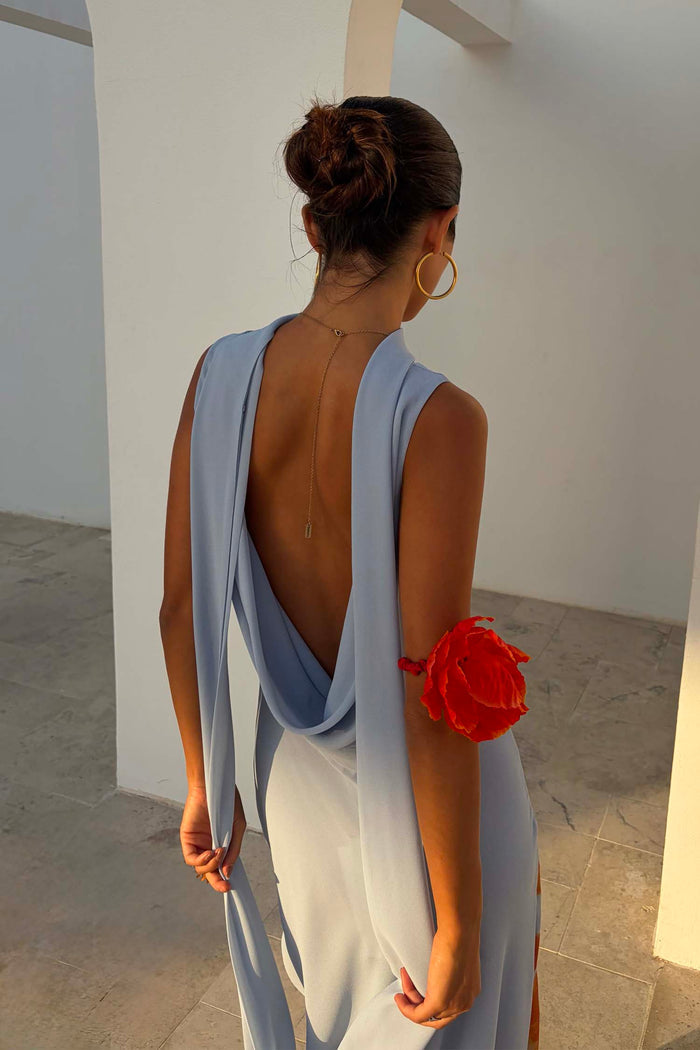 Ice Blue Sophie Dress showing the low draped back and multi-wear scarf detail, perfect for summer wedding guest styling.