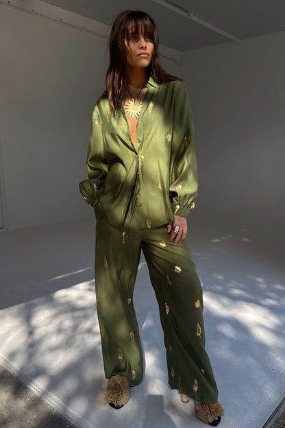 Khaki Shell Trousers with a gold shell print, featuring a wide-leg fit and matching shirt as a chic co-ord set.