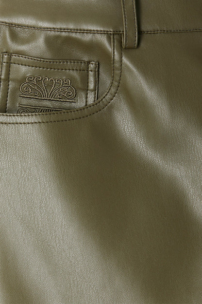 Khaki vegan leather trousers featuring a detailed view of the front pocket and signature embroidered logo.