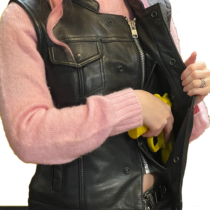 Ladies Dot Leather Club Vest: FEATURES:


Club style with banded collar, covered snaps and cropped center zipper
Two buttoned