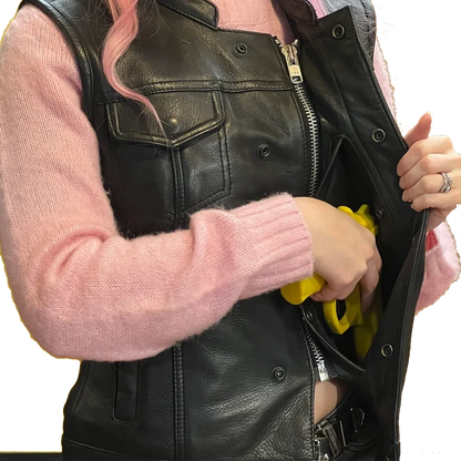 Ladies Dot Leather Club Vest: FEATURES:


Club style with banded collar, covered snaps and cropped center zipper
Two buttoned