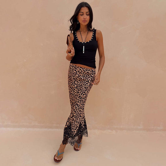Leopard Lace Midi Maeva Skirt with a black lace hem, paired with a black tank top for a versatile transeasonal look.