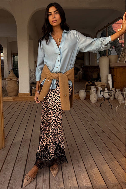 Iconic Leopard Lace Midi Maeva Skirt with a black lace hem, styled with a blue shirt and tied tan jumper.