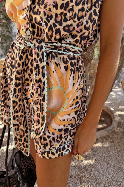 Leopard Print Playsuit featuring a soleil sun print, contrast turquoise trim and a matching waist tie.