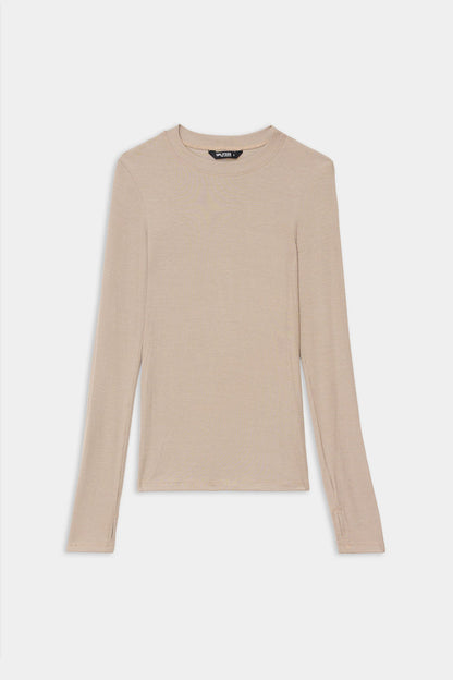 The SPLITS59 Louise Rib Long Sleeve in Latte is laid flat on a white background, ideal for gym workouts and everyday wear. Made in Los Angeles.