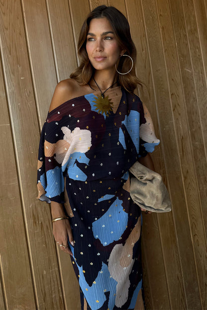 Mara Abstract Tilly Dress in brown plisse with blue abstract patterns and gold metallic flecks.