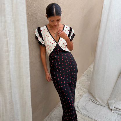 Mono Rose Betsy Midi Dress with red rose print, contrast panels, frill sleeves and a tie-detail V-neckline.