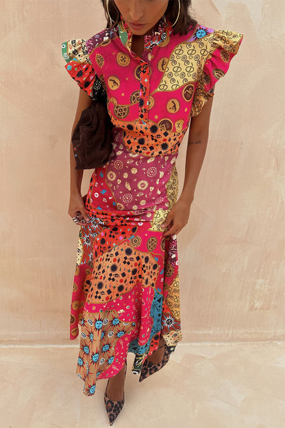 Morocco Remi Dress featuring a watercolour patchwork sun print with a pleated frill neckline and an a-symmetrical hem.