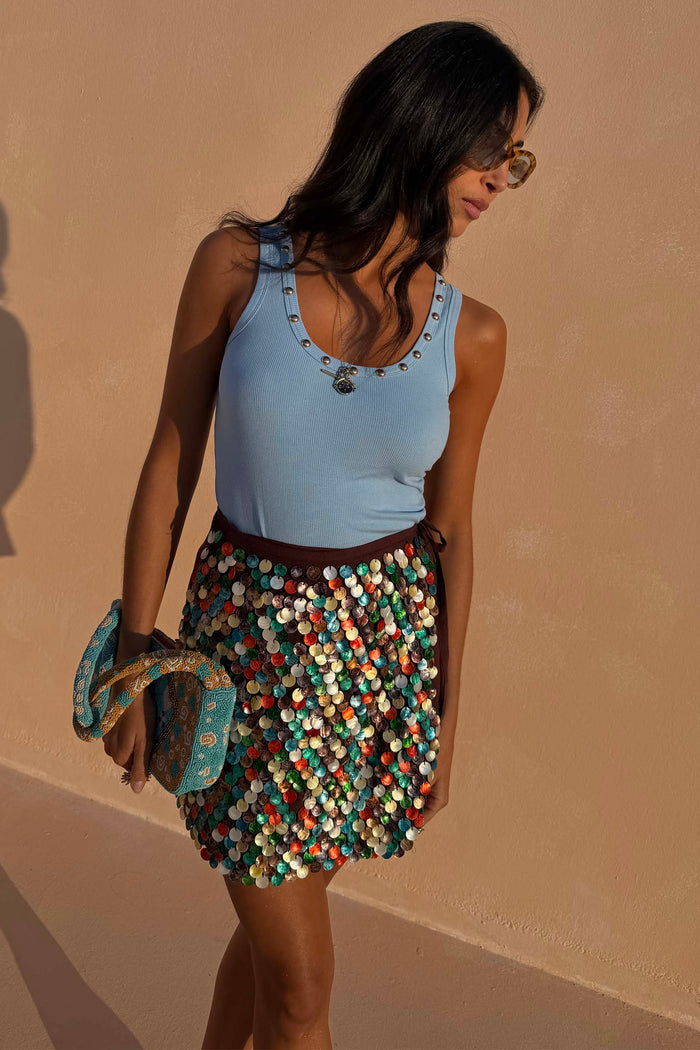 Black Multi Shell Mini Wrap Skirt featuring multicoloured pearlescent shell beads and a wrap tie detail.
