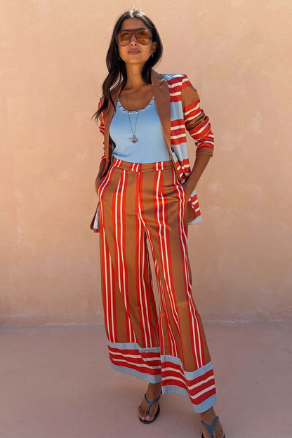 Wide-leg Multi Stripe Marnie Trousers with a satin-esque finish, styled with a matching blazer for feel good dressing.