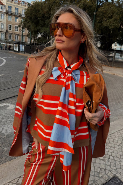 Multi Stripe Tank Top in tan and red soft touch knit, layered with a draped blazer for a London look.