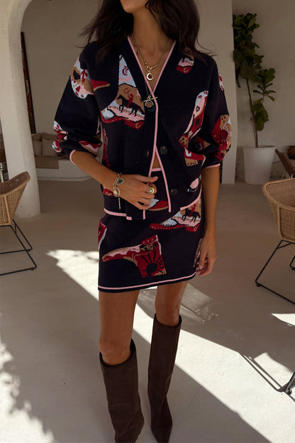 Navy Cowboy Boots Jake knit mini skirt with cowboy motifs and pink trim, styled as a matching co-ord.