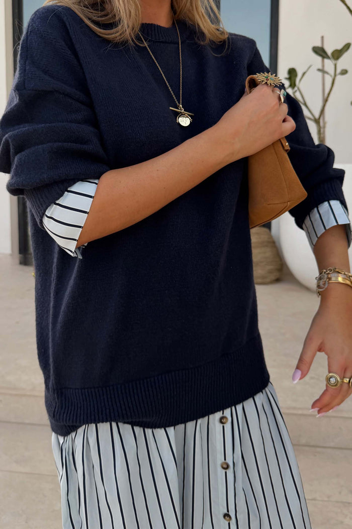 Navy Knit Jumper Dress in a soft-touch navy knit with a blue striped cotton shirt-style skirt and cuffs.