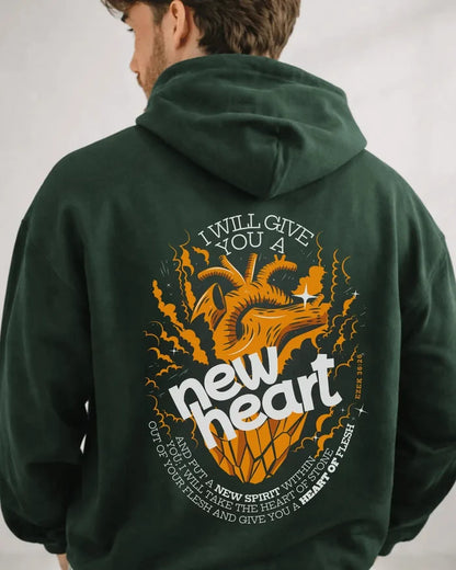 Person wearing a green hoodie with a dragon graphic and text on the back, on a plain background