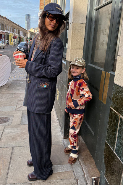 NFD Kids Aspen Jogger and matching knitted jumper with a geometric print on a child in London.
