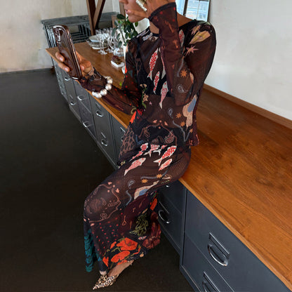 Night Garden Mesh Dorris Skirt and matching top co-ord featuring leopard, fish and poppy motifs on sheer dark mesh.