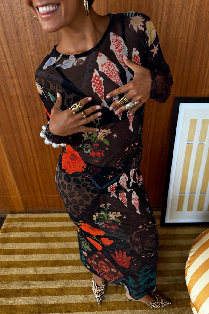 Night Garden Mesh Dorris Skirt and matching top featuring a multi-motif print with leopard, fish, and floral patterns.